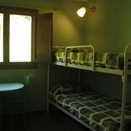 La Escuela De *